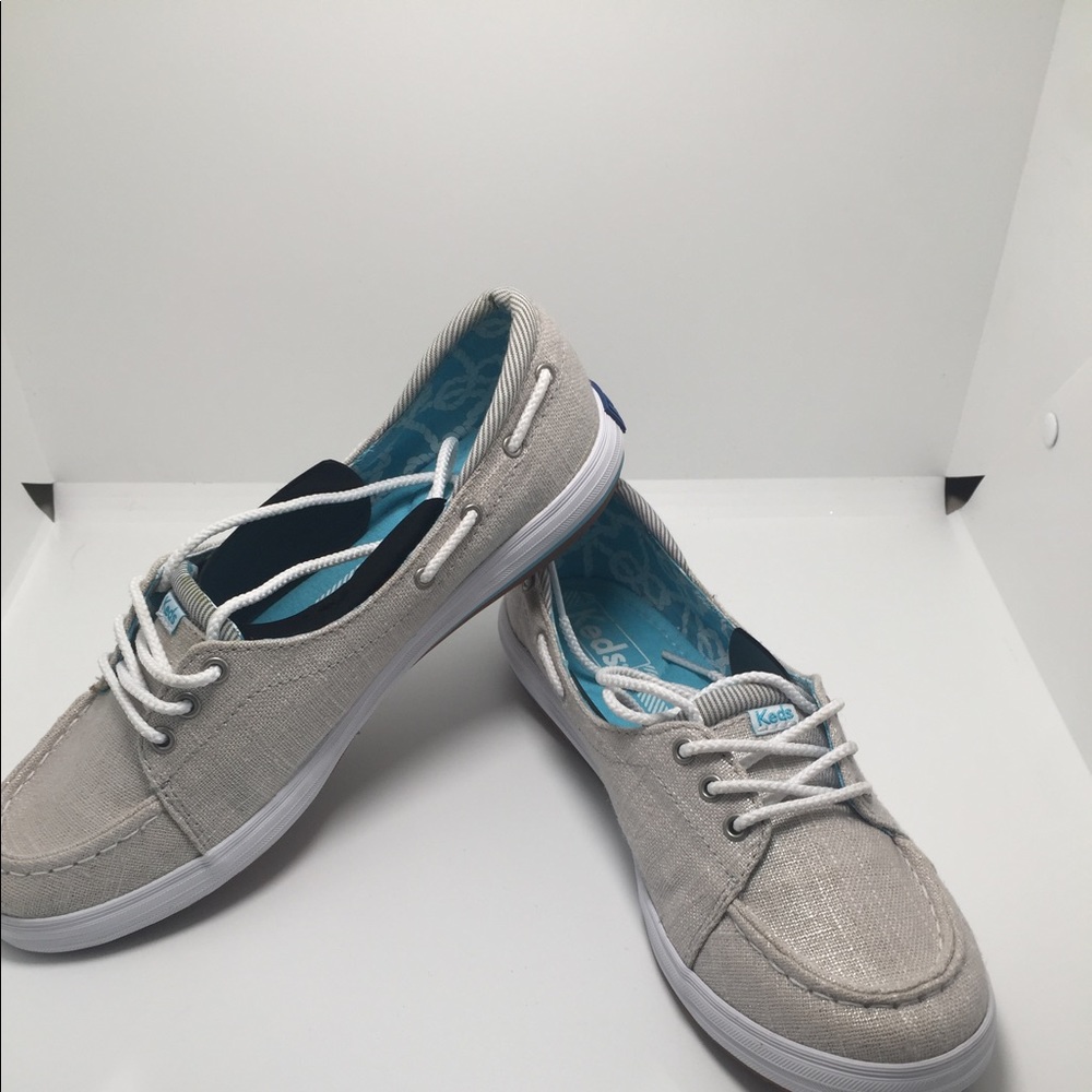 Keds iridescent gold boat shoes
